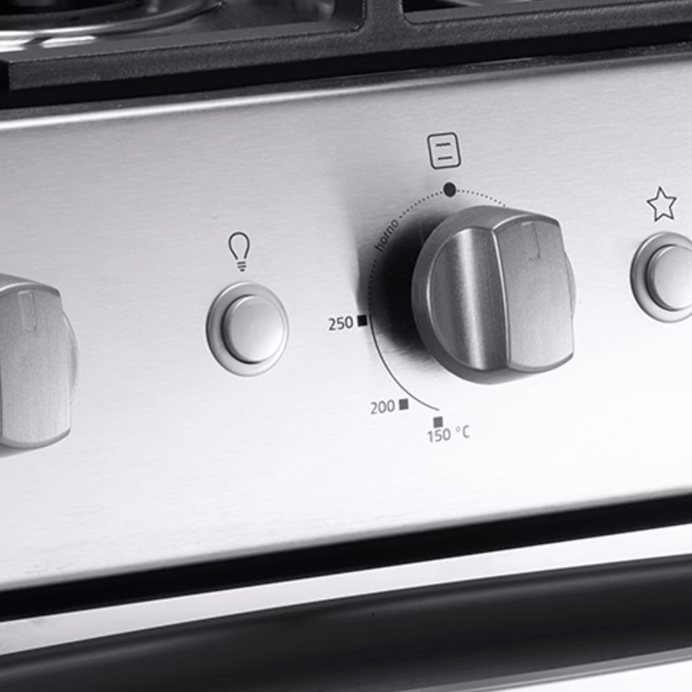 Cocina a gas Indurama Turin Zafiro perillas de control y encendido primer plano disponible en granhogar