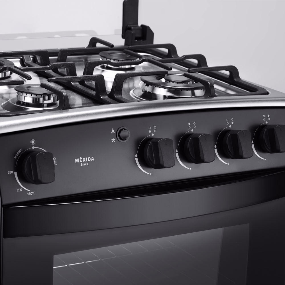 Cocina a gas Indurama Merida Black Quarzo perillas y quemadores primer plano