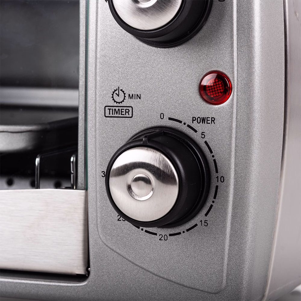 Horno tostador HTI-10L 10L Indurama detalle del control de tiempo y perillas adquiérelo en granhogar
