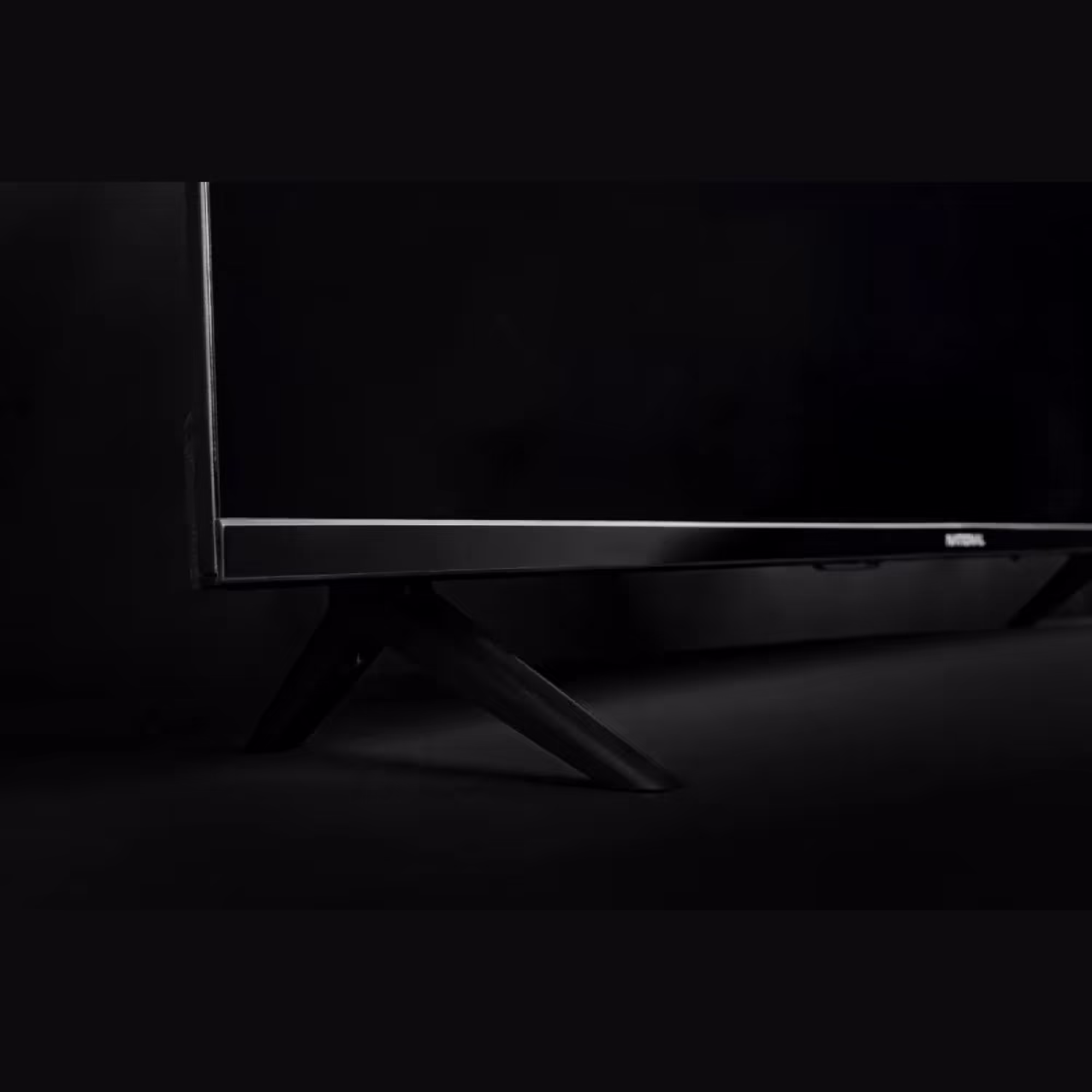 Televisor National ELED65KA1 4K Vista base de soporte
